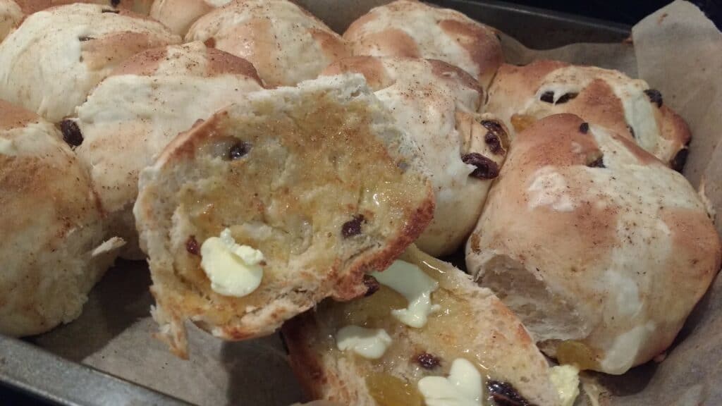 Homemade hot cross buns with lashings of butter